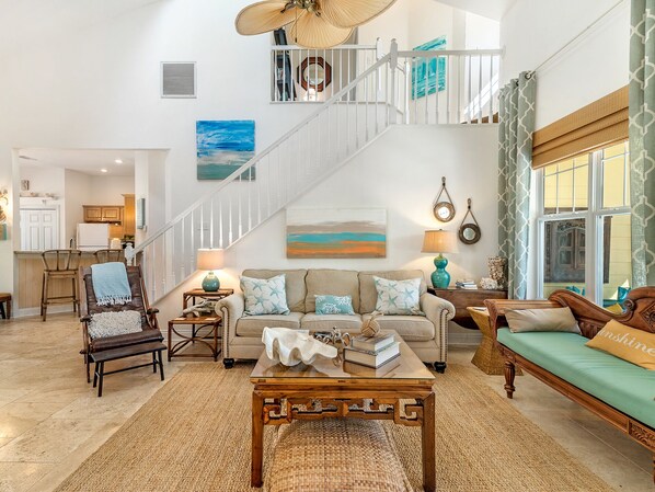 Flat-screen TV, DVD player, books, stereo