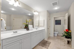 Shower, jetted tub, hair dryer, towels