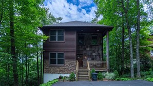 A two-story house with a stone foundation, wooden siding, and a front porch with a staircase. - A Peak of Heaven 1 mi from Blue Ridge Parkway very private ping pong table (Boone)