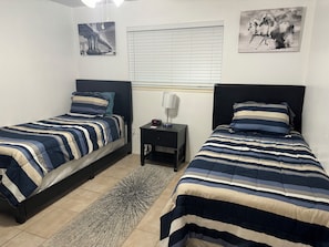 2 bedrooms, in-room safe, iron/ironing board, travel cot