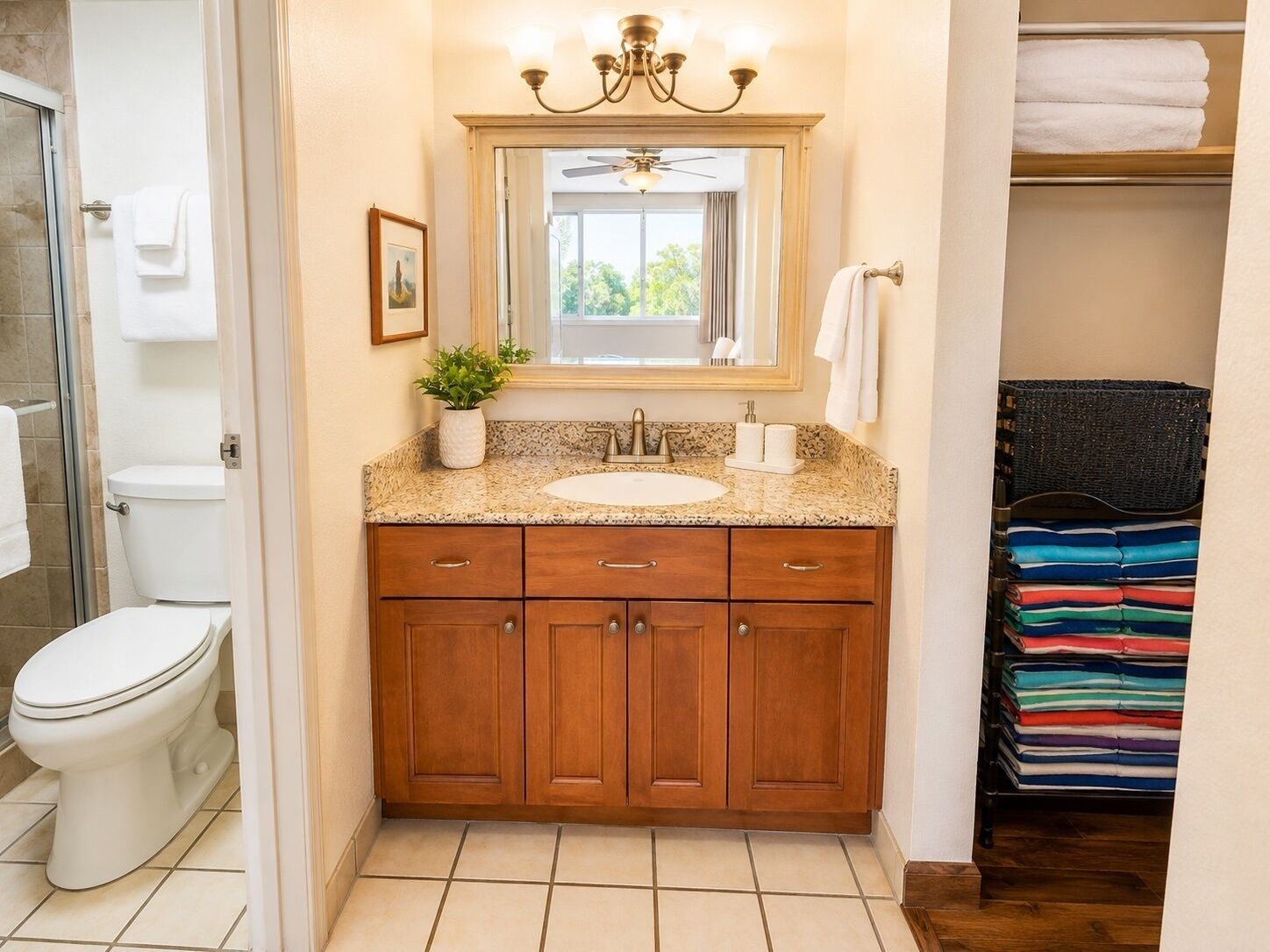 A bathroom with a sink, vanity, and a mirror.