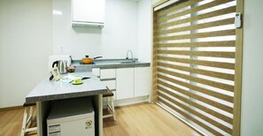 Full-sized fridge, microwave, stovetop, electric kettle