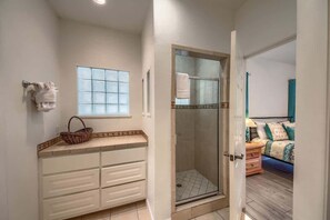 Combined shower/bathtub, hair dryer