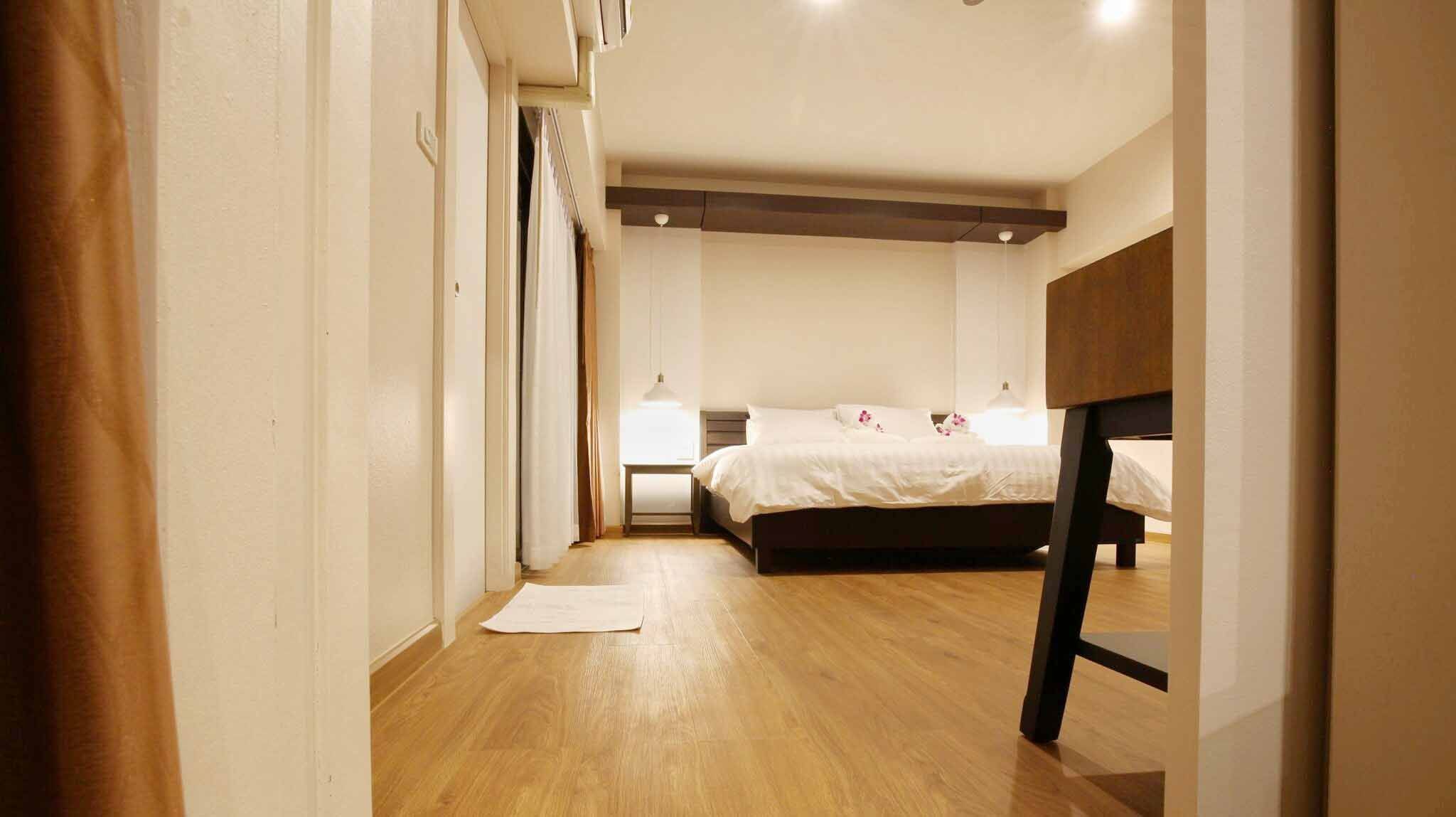 Exclusive Suite with Balcony | มินิบาร์ฟรี, Wi-Fi ฟรี, ผ้าปูที่นอน