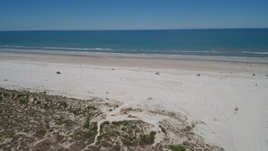 A beach with a clear view of the ocean and sandy terrain. - Beach On Site: 2BR/2BA with Pool & Easy Beach Access (St. Augustine)