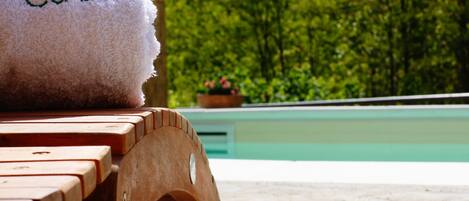 Outdoor pool, pool umbrellas, sun loungers