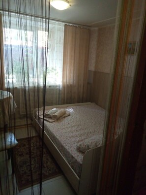 Standard Double or Twin Room, Shared Bathroom | Iron/ironing board, free WiFi, bed sheets - Nomera na Sibirskoy (Perm)