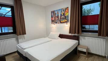 Doppelzimmer zur Einzelnutzung | Hochwertige Bettwaren, Zimmersafe, Schreibtisch, kostenloses WLAN