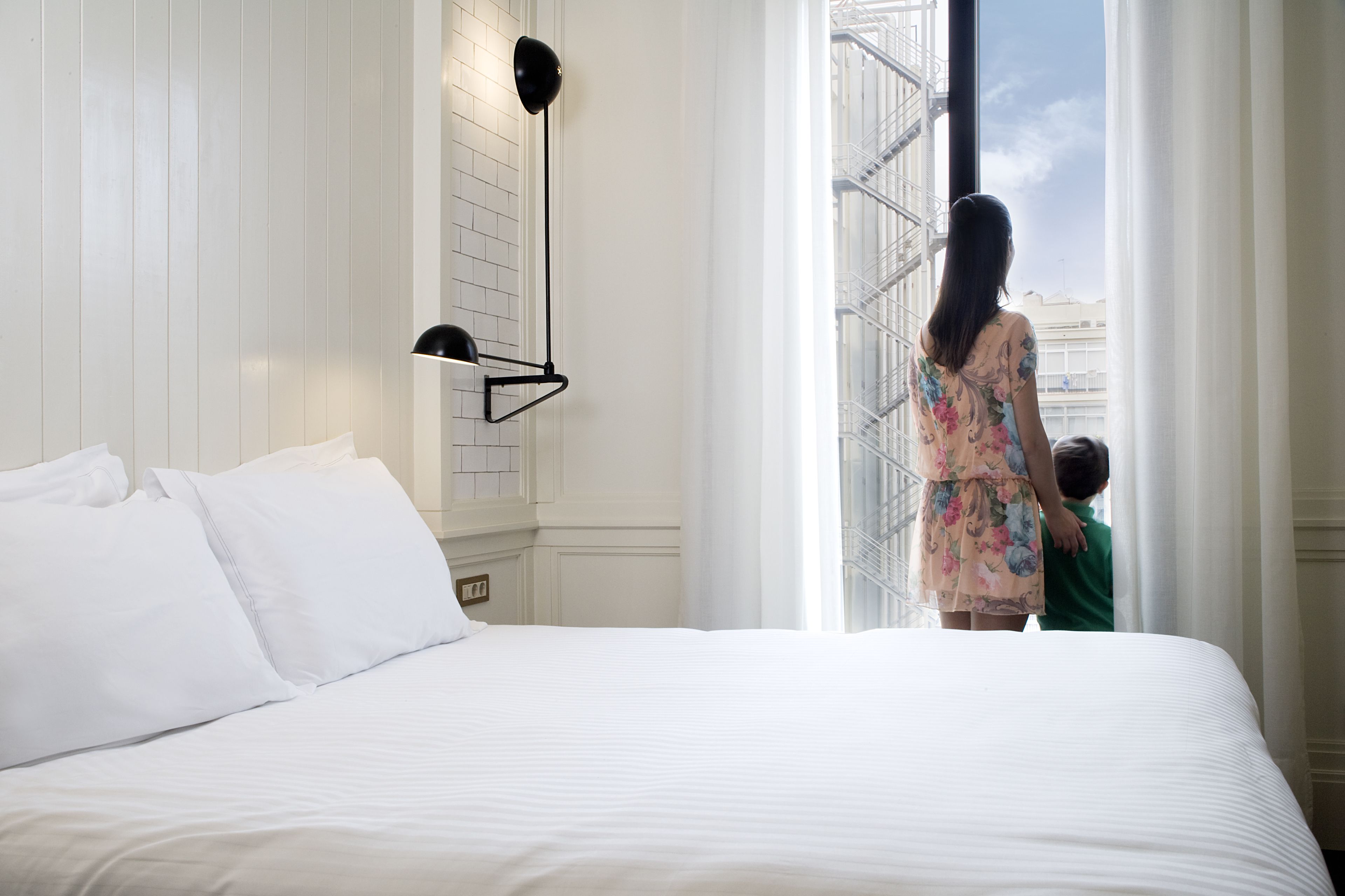 family room, 2 bedrooms | in-room safe, desk, soundproofing, iron/ironing board