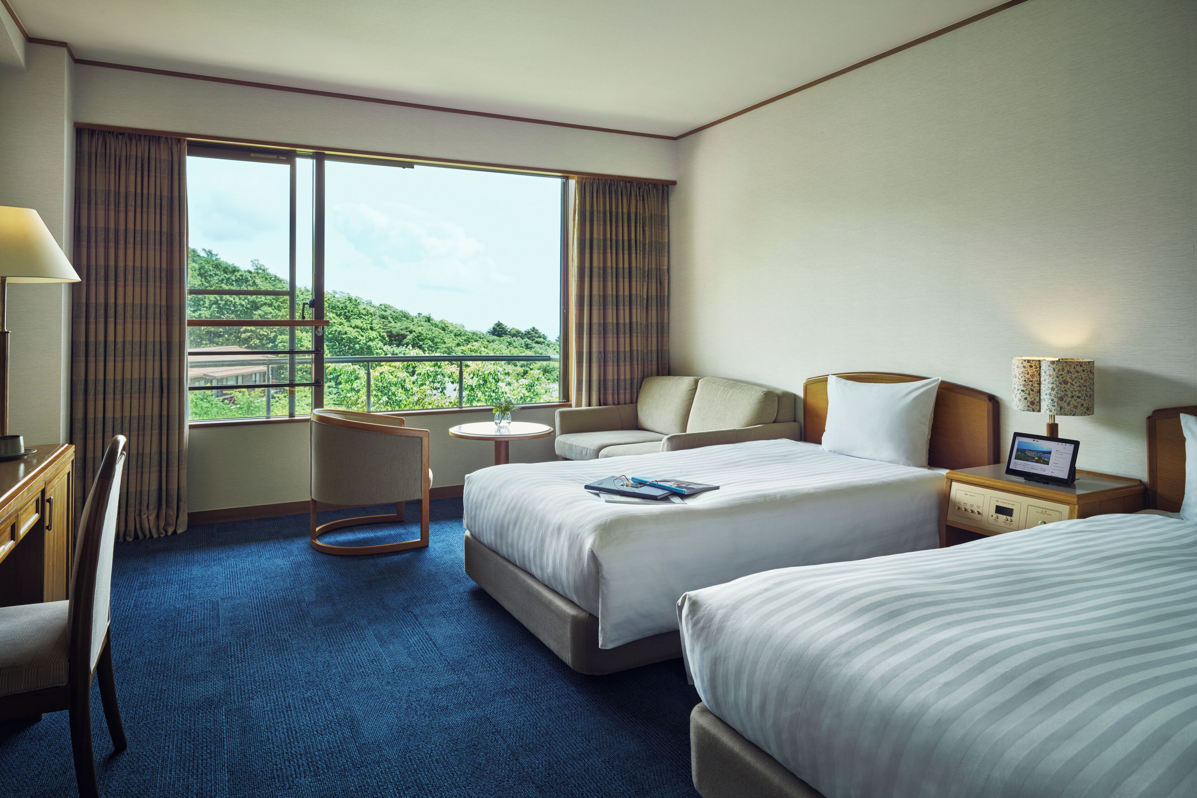 Chambre Standard avec lits jumeaux | Coffre-fort, accès au Wi-Fi (inclus), literie fournie