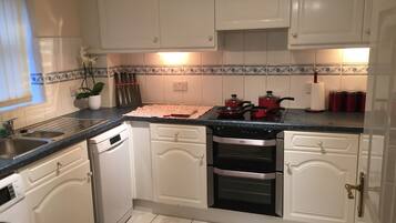 Apartment, 2 Bedrooms, Accessible, Ground Floor | Private kitchen | Fridge, oven, dishwasher, cookware/dishes/utensils