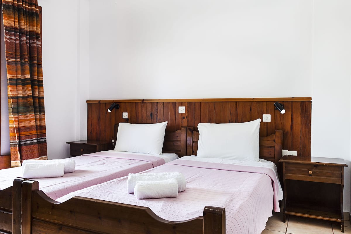 superior twin room, garden view | in-room safe, free cots/infant beds, free wifi, bed sheets