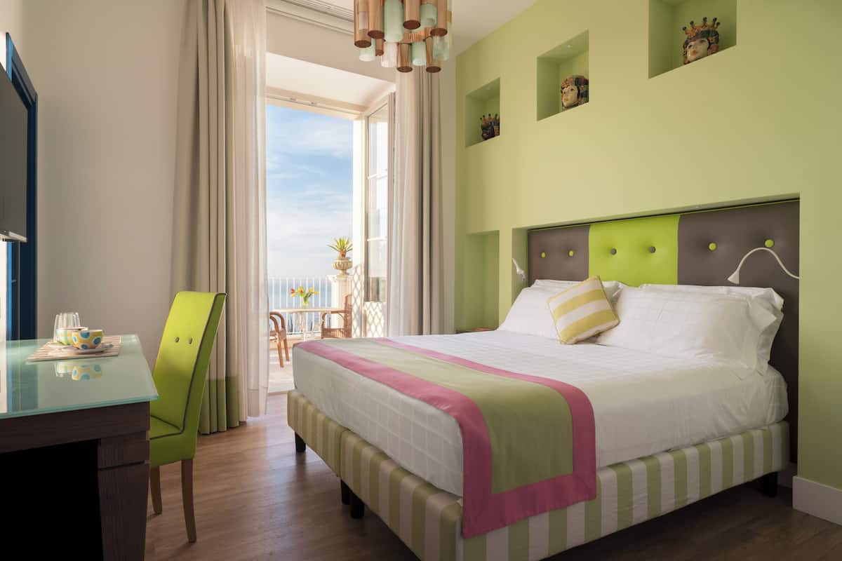 Deluxe Double or Twin Room, Balcony, Sea View | Premium bedding, minibar, in-room safe, individually decorated