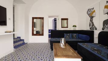 Family Suite, 1 Bedroom, Terrace, Garden View | Living area | Flat-screen TV, pay films