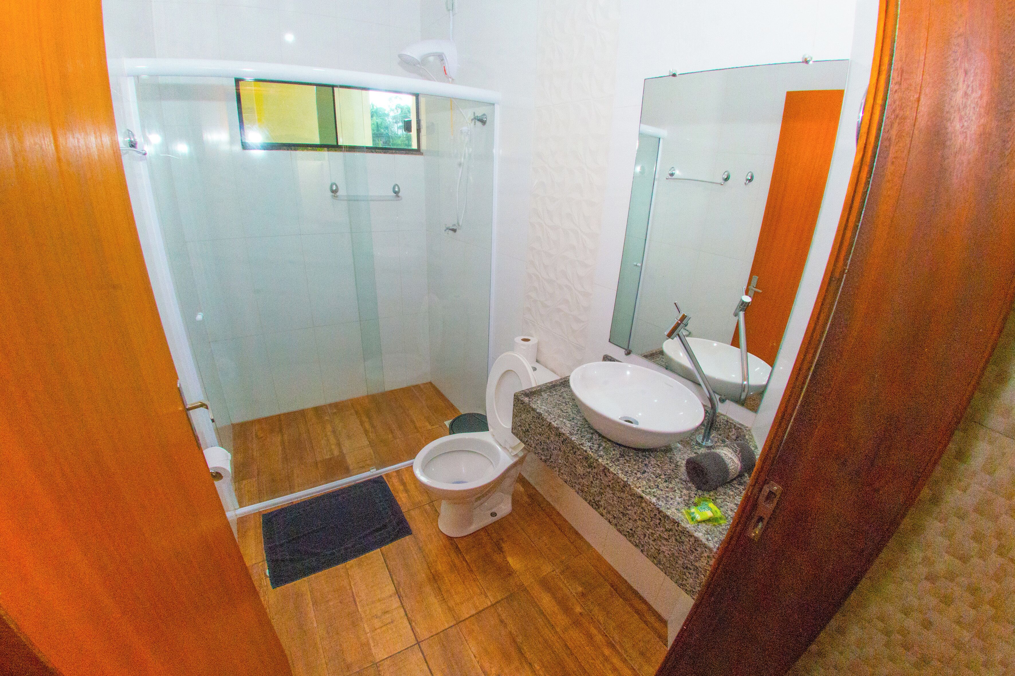 standard quadruple room | bathroom | shower, hair dryer, towels