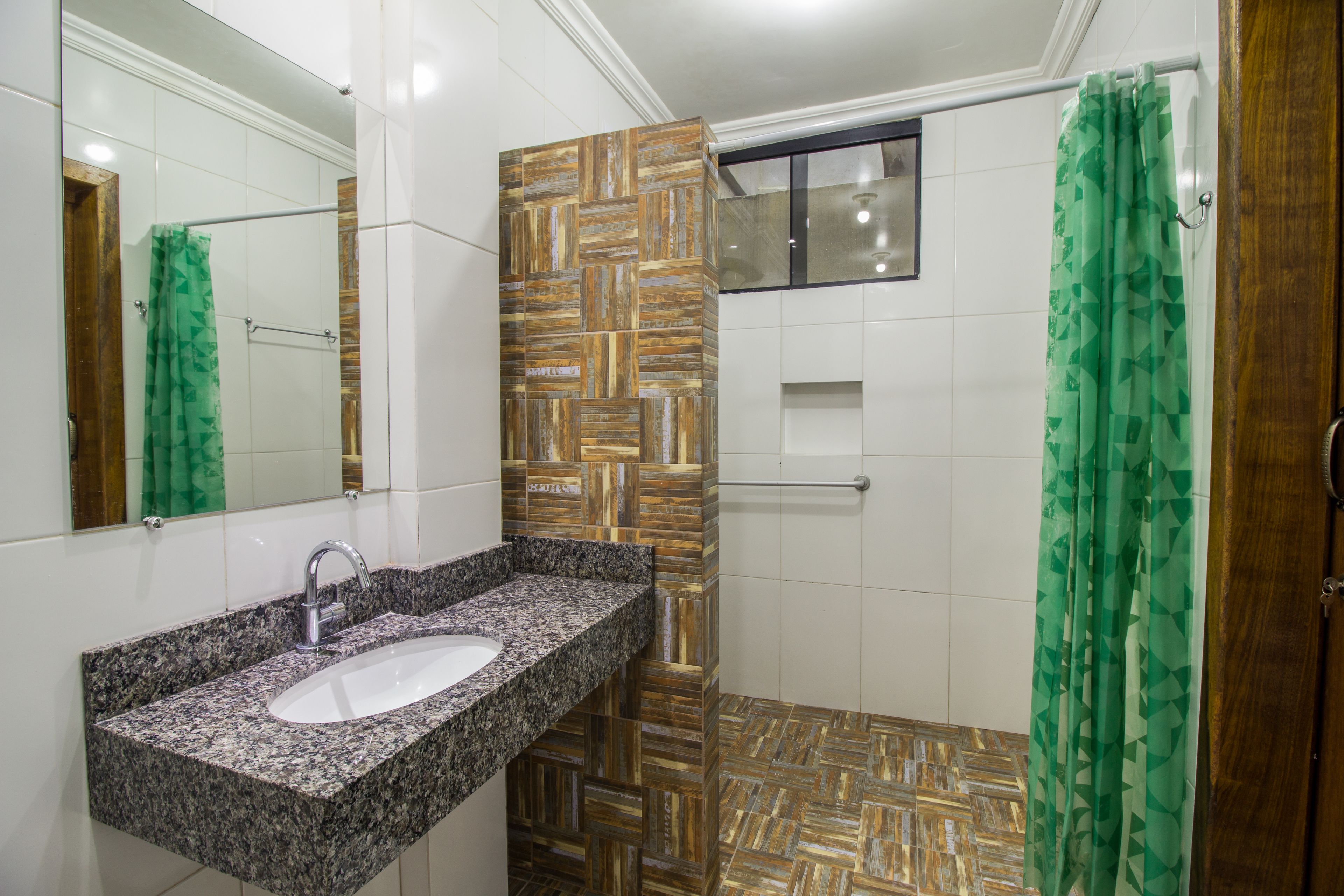 standard quadruple room | bathroom | shower, hair dryer, towels