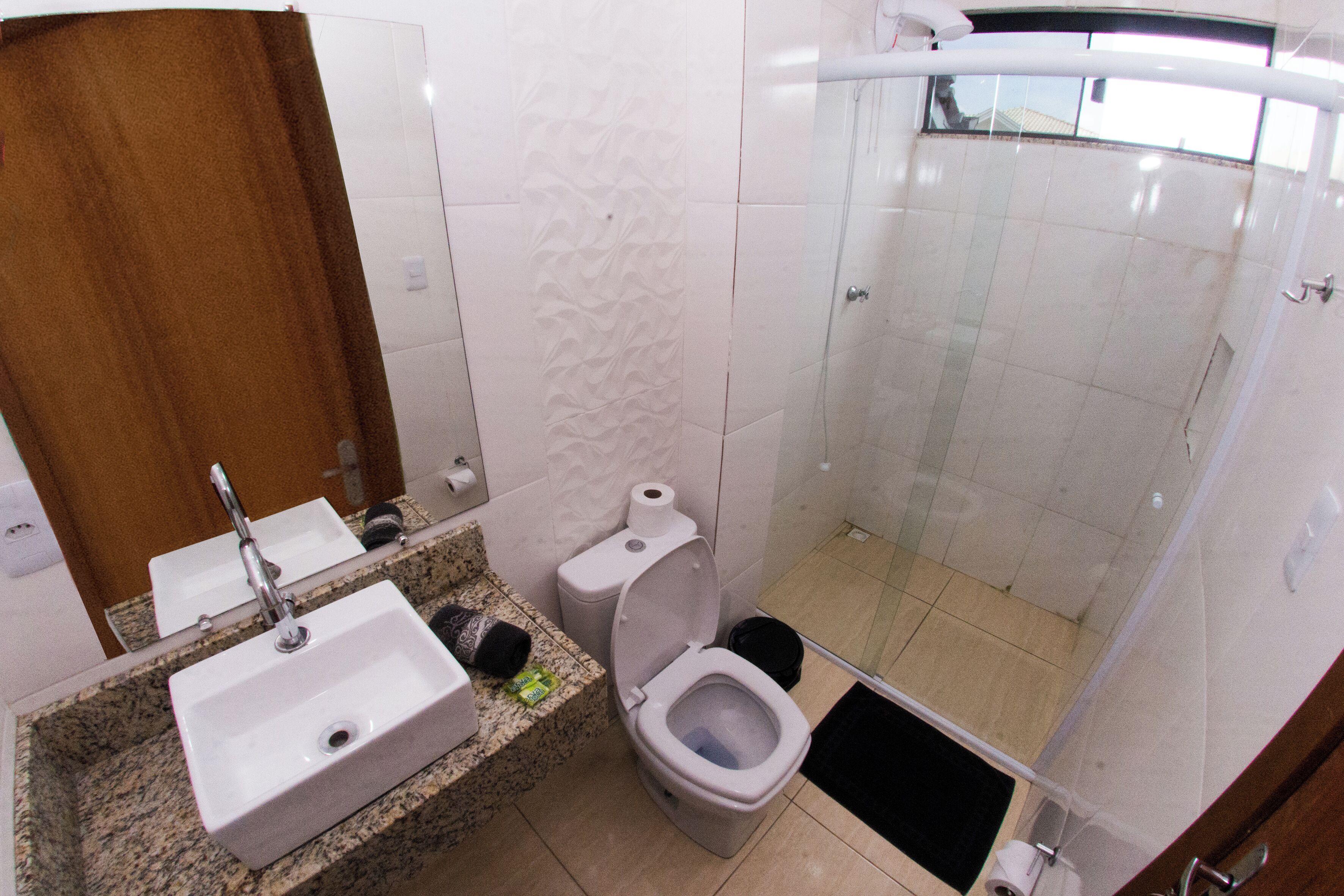 standard quadruple room | bathroom | shower, hair dryer, towels