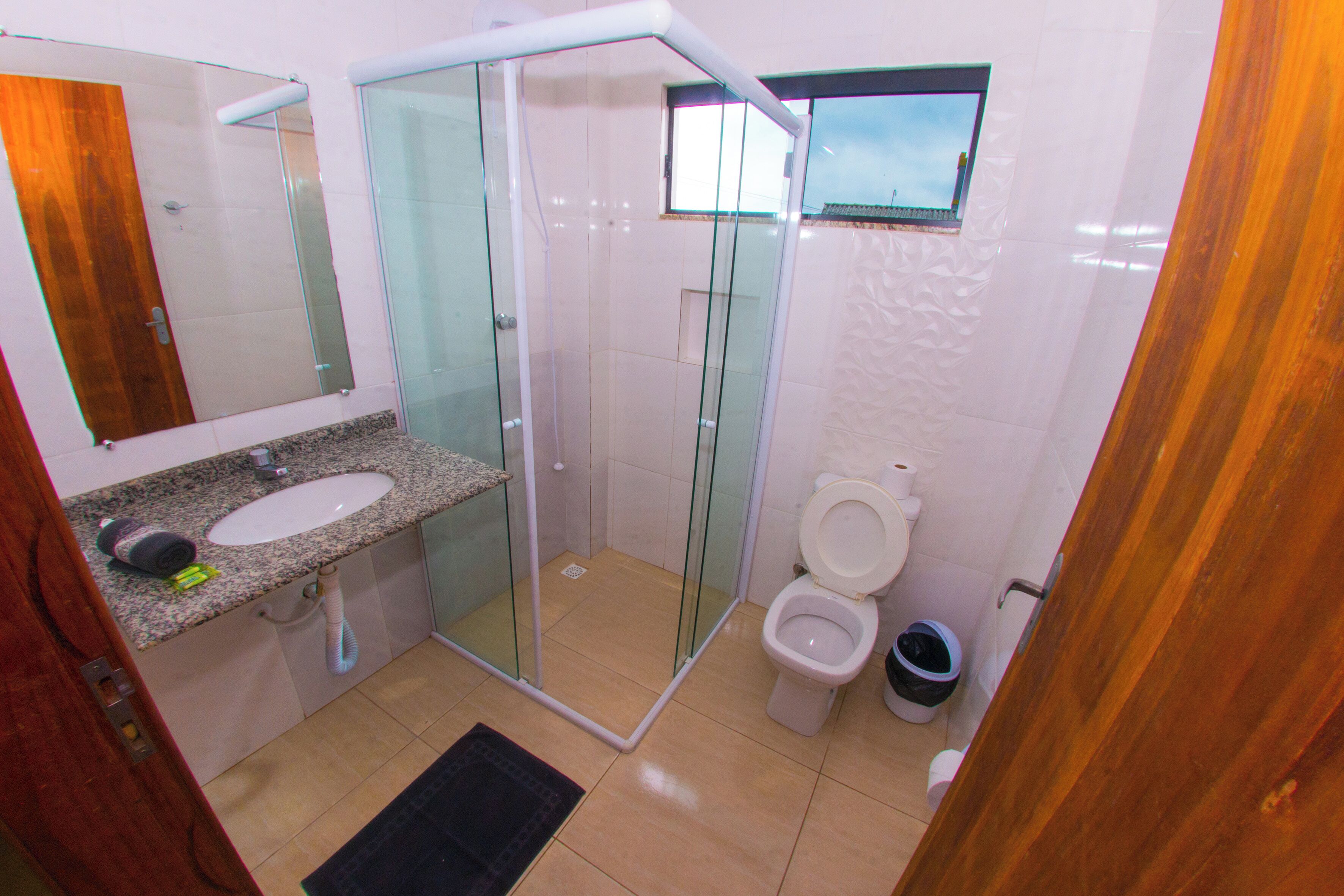 standard triple room | bathroom | shower, hair dryer, towels