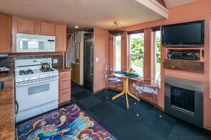 Fridge, stovetop, dishwasher, coffee/tea maker