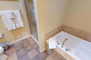 Shower, hair dryer, towels, shampoo