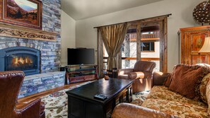 Flat-screen TV, fireplace, video games, DVD player