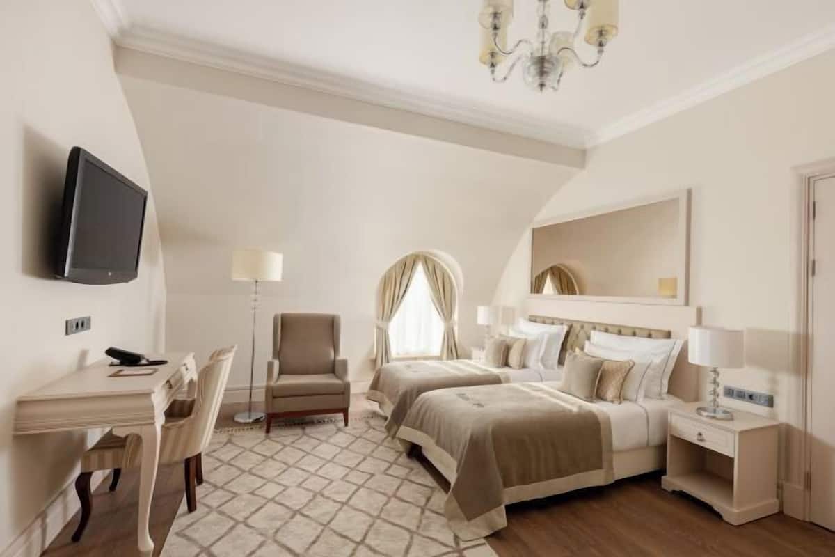 Premium bedding, pillow-top beds, minibar, in-room safe