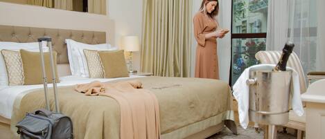 Premium bedding, pillow-top beds, minibar, in-room safe