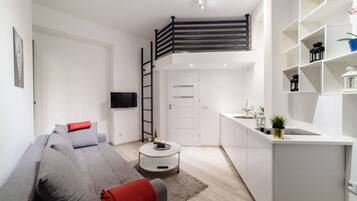 Apartment (L1E) | Living area | Flat-screen TV