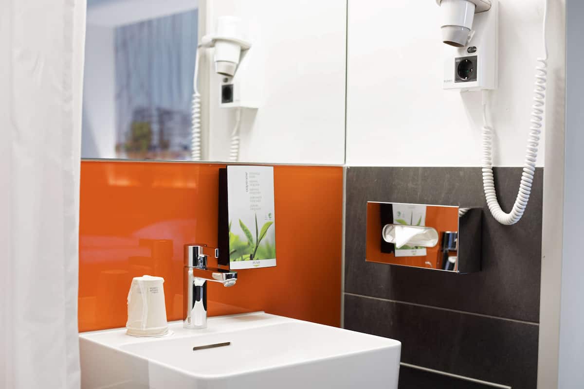 shower, eco-friendly toiletries, hair dryer, towels