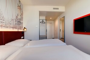 Cortinas blackout, quartos à prova de som, Wi-Fi de cortesia