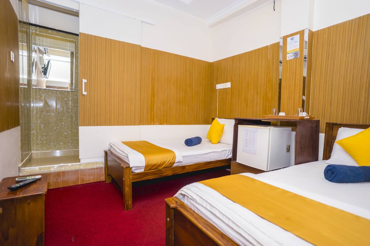 Premium bedding, desk, iron/ironing board, rollaway beds