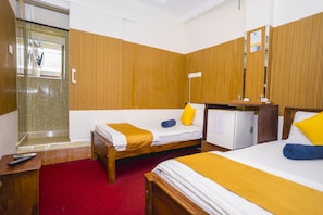Premium bedding, desk, iron/ironing board, rollaway beds