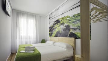 Caja fuerte, cortinas opacas, sistema de insonorización y wifi gratis