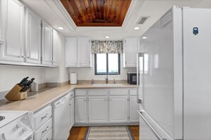 Fridge, microwave, oven, stovetop - Station One - 5C Stewart-Oceanfront condo with community pool, tennis, beach (Wrightsville Beach)