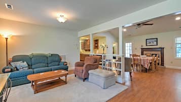 TV, fireplace, books