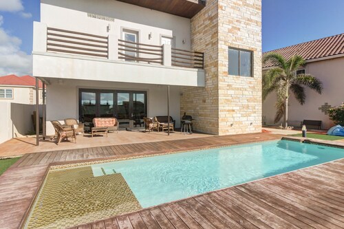 Modern Waterfront Home with Stunning Private Pool & Deck - Dog Friendly