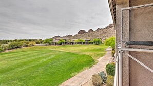 A view of a well-maintained lawn with a pathway leading to a building, surrounded by a mountainous landscape. - Golf Course View & Pool Access: Gold Canyon Gem (Gold Canyon)