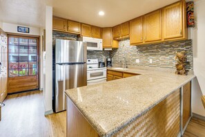 Fridge, microwave, stovetop, coffee/tea maker