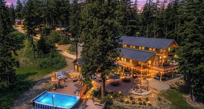Private Retreat in the Woods on 20 Acres! Grand Lodge with 8 Studio Cabins!!