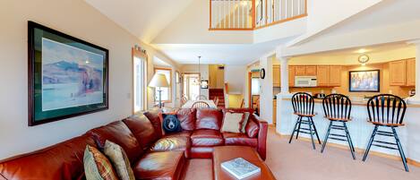 Televisión, chimenea, reproductor de DVD y futbolito