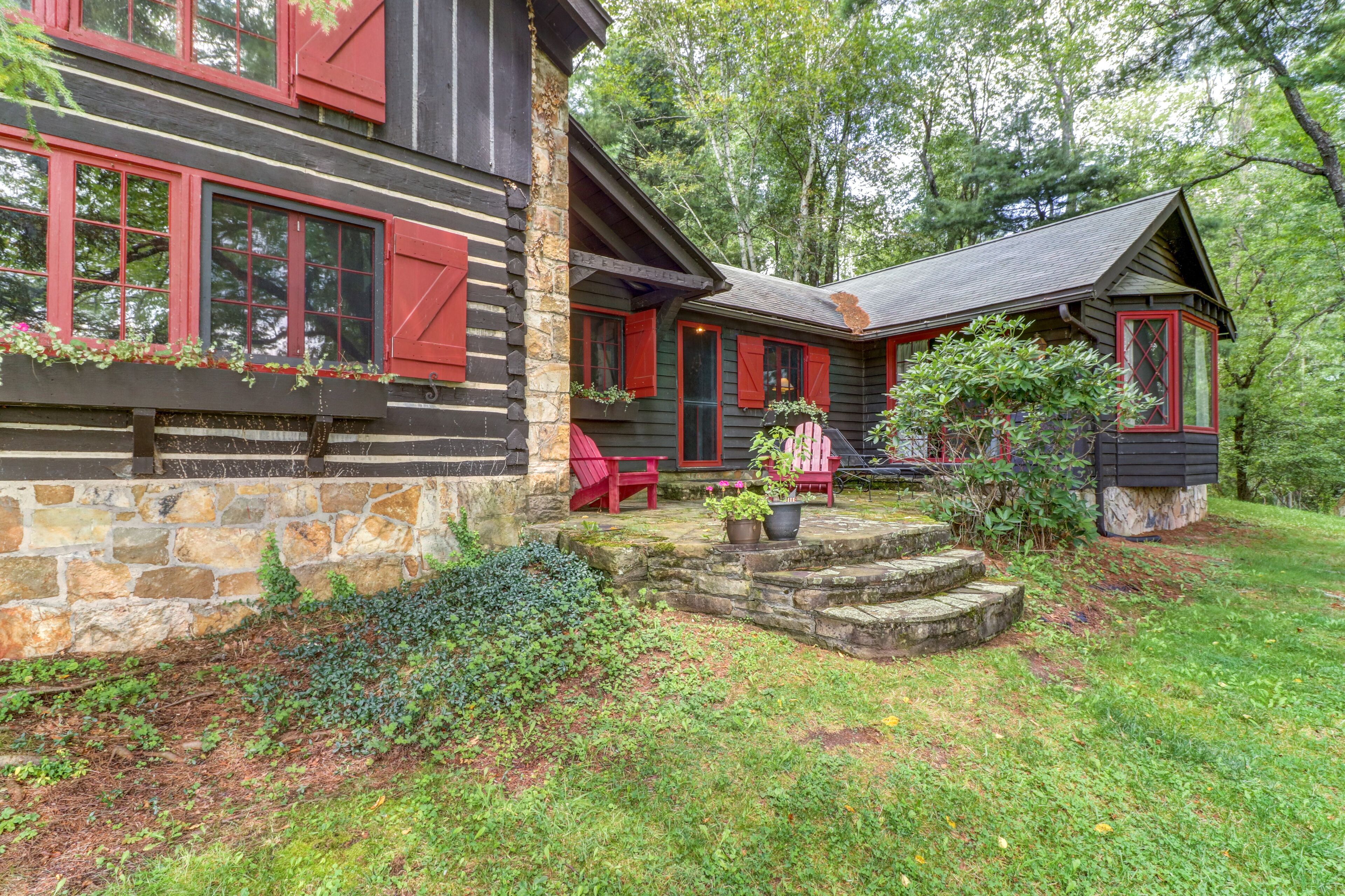 Dog-friendly Lakefront Log Home on a Quiet Cove with Front Deck & Private Dock