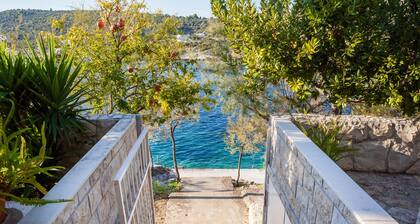 Apartment Bose 6+0 with big balcony and sea view only 5 meters from beach