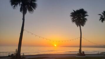 On the beach, sun loungers