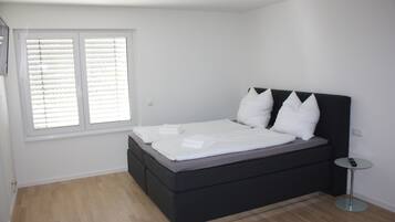 2 bedrooms, soundproofing, iron/ironing board, travel cot