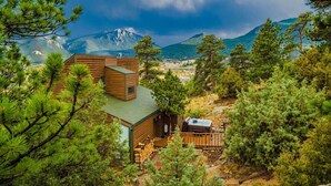A cabin with a wooden exterior, a hot tub, and a view of mountains. - Best Views, Hot Tub Near National Park! King Beds! (Estes Park)