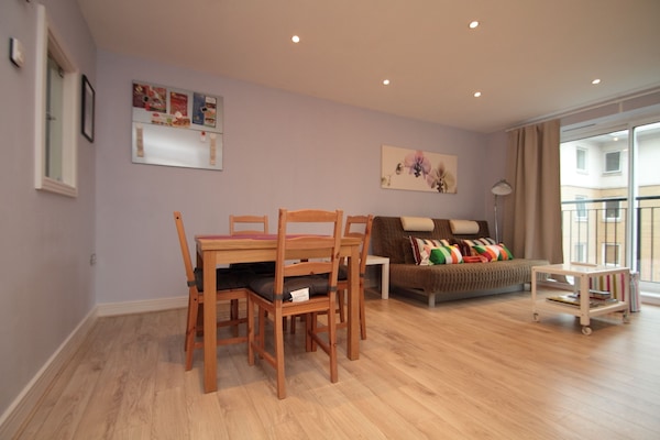 Spacious and well-lit living and dining space