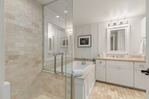 Bathtub, hair dryer, towels, soap