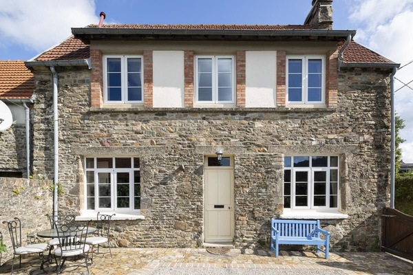Front of Glatigny Farmhouse, south face walled garden with large bbq and pit.
