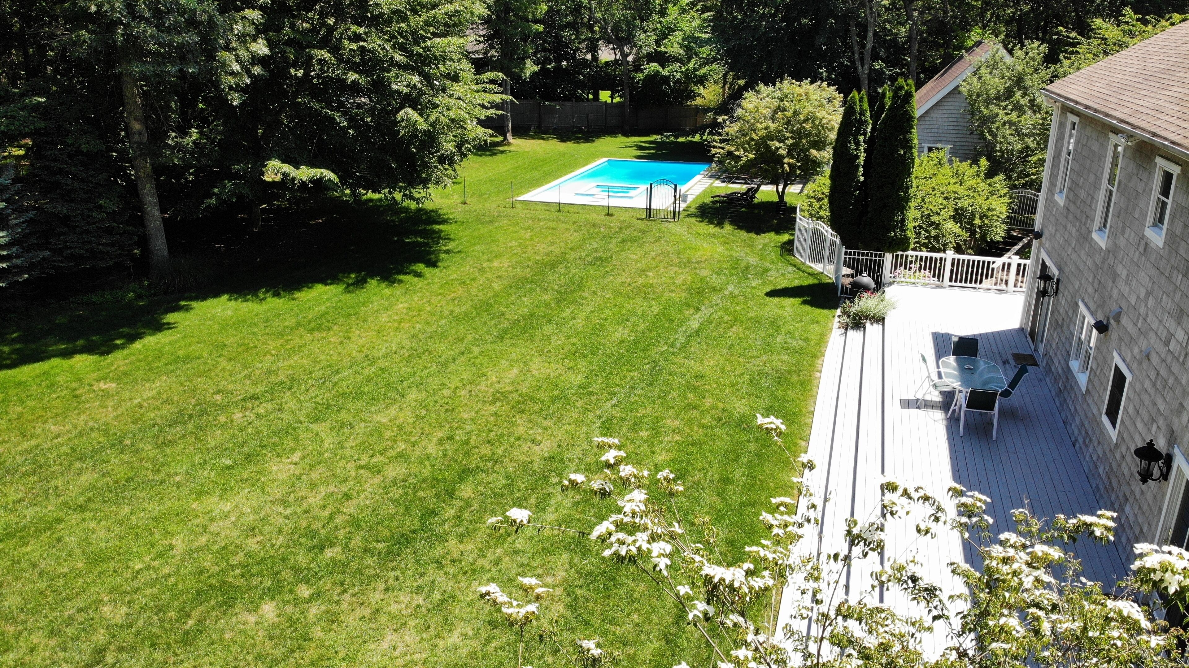 Outdoor pool, a heated pool, pool umbrellas