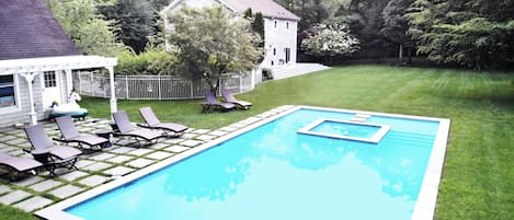 Outdoor pool, a heated pool, pool umbrellas